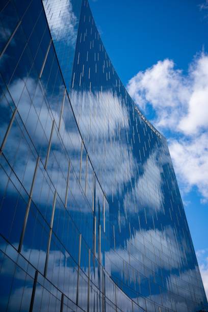 istock a glass building has a sky reflected in it's glass windows 1483521067