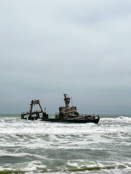 istock Sunken trawler, shipwreck. Old rusty metal ship Zeila at Skeleton Coast Namibia. 1483522040