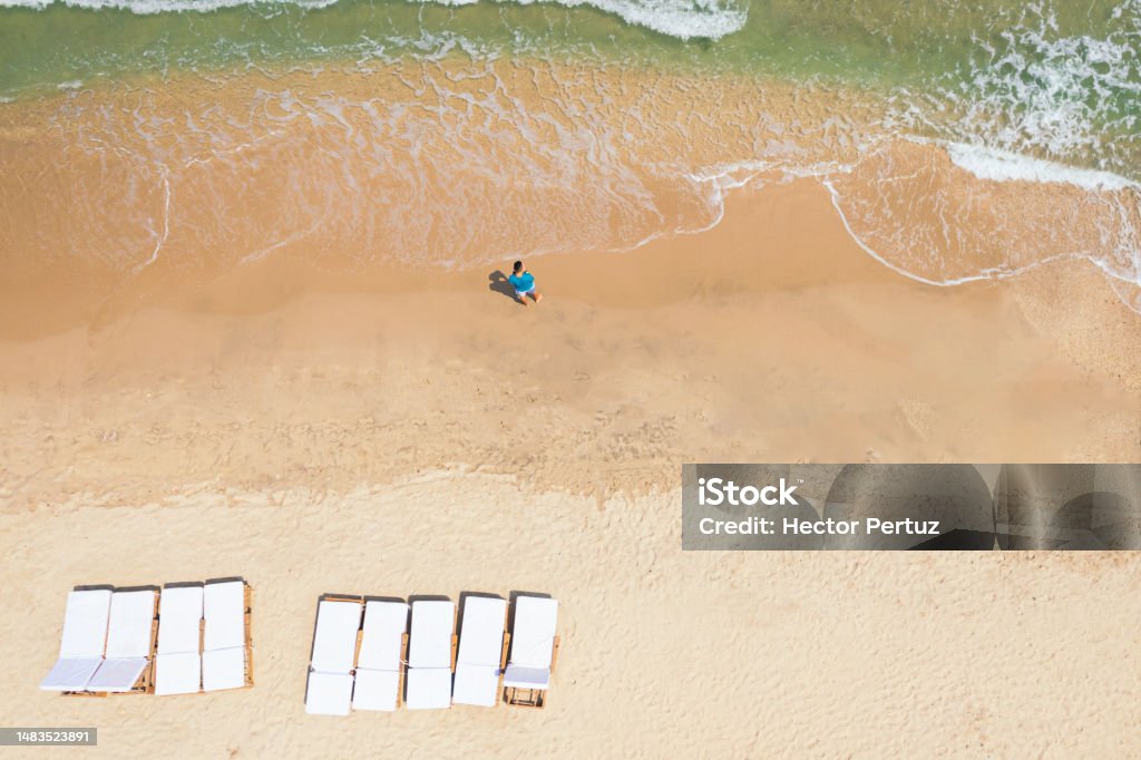 Aerial view of a man on the beach on the Caribbean coast. 30-34 Years Stock Photo