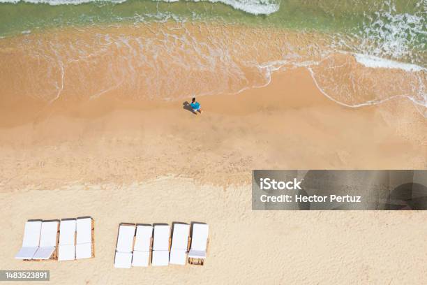 Aerial View Of A Man On The Beach On The Caribbean Coast Stock Photo - Download Image Now