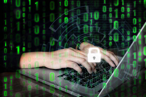 istock Dangerous Hooded Hacker typing bad data into computer online system and spreading to global stolen personal data on computer with virtual screen interfaces.Cyber security concept 1483524048