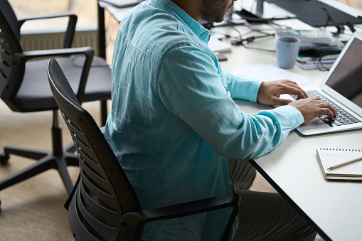 Picture Enter Into Computer Man Entering Data Into Laptop At Work Stock Photo - Download Image Now ...