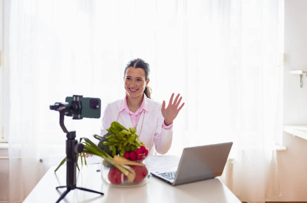 istock Young Female Nutritionist Shares Her Knowledge on Camera 1483527330