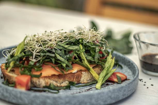 istock Image of a freshly made spinach toast on a table 1483528852