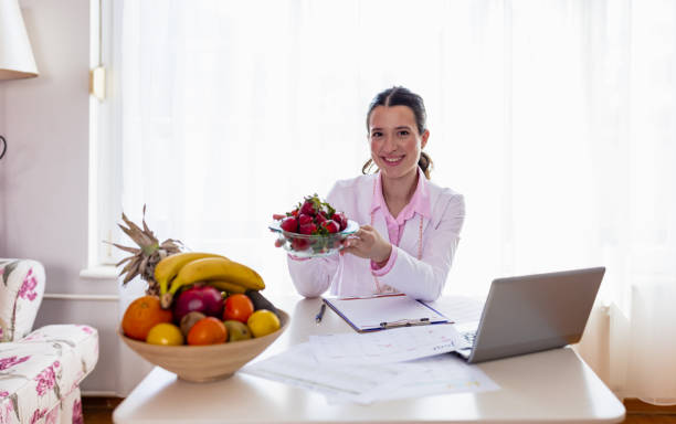 istock Nutritionist Delighted with Fresh Produce 1483529022