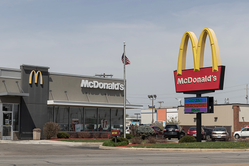 Marion - Circa April 2023: McDonald's Restaurant. McDonald's is offering employees higher hourly wages, paid time off, and tuition payments.