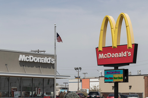 Marion - Circa April 2023: McDonald's Restaurant. McDonald's is offering employees higher hourly wages, paid time off, and tuition payments.