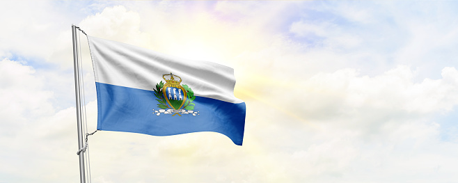 San Marino flag waving on sky background. 3D Rendering