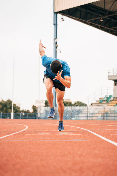 Young man athlete, track runner stock photo