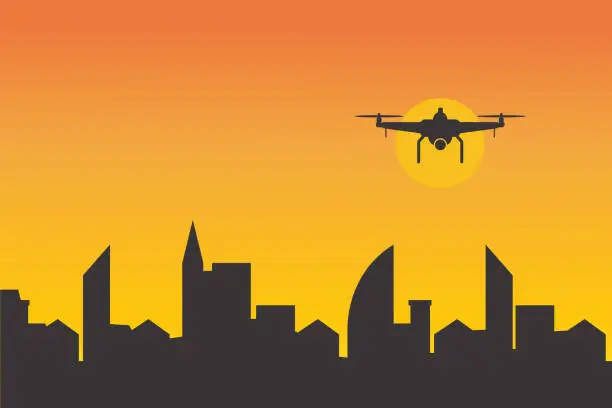 Vector illustration of Silhouette of flying drones with action camera in sunset sky above buildings in urban area
