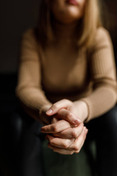 istock Young woman anxiously cracking her knuckles, struggling with negative emotions 1483539066