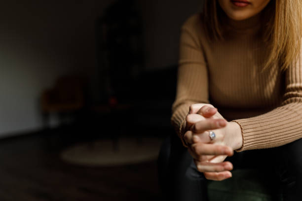 istock Young woman anxiously cracking her knuckles, struggling with negative emotions 1483539068