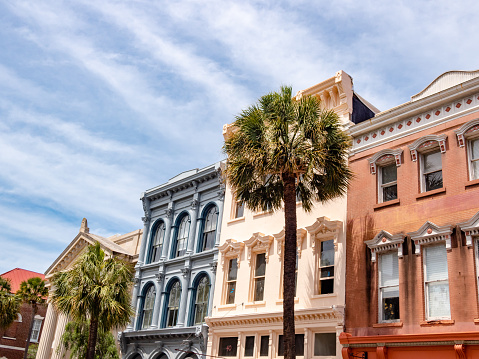 Colorful row of houses on Broad Street, in the historical district of Charleston, SC.