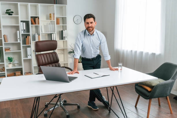 istock Front view. Doctor in formal clothes is working in the cabinet 1483542294