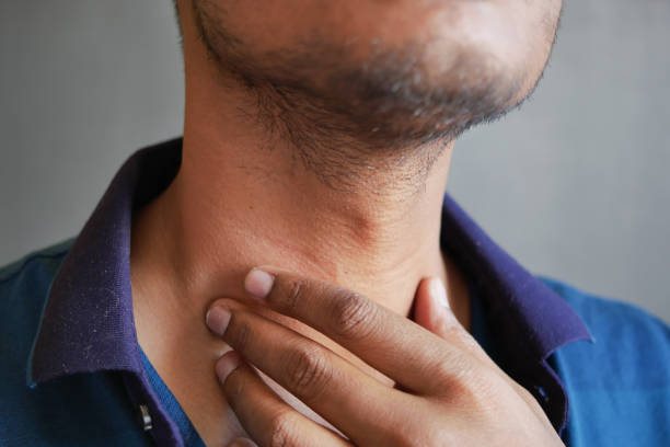istock unrecognized man suffering throat pain close up 1483544075