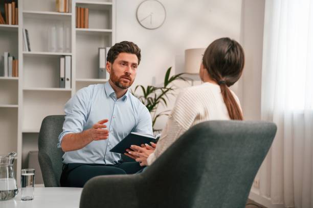 istock Session with psychologist. In the cabinet 1483544852