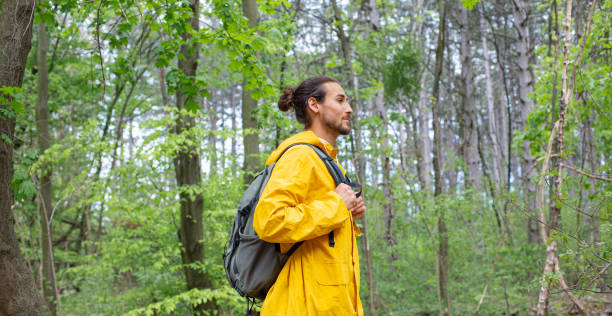 istock Long hair man in forest 1483552530