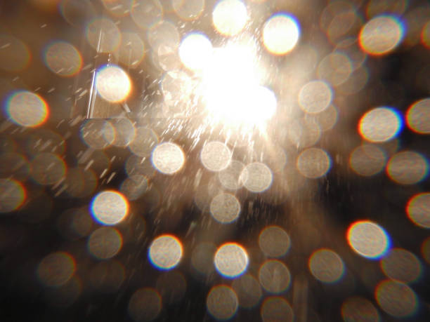 Abstract background of water drops and light effects in the shower