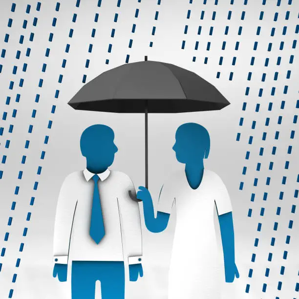 Paper man and woman under umbrella sheltering from rain
