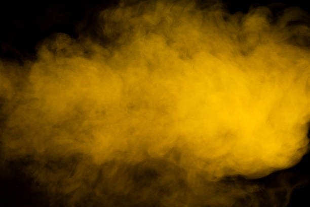 istock Yellow steam on a black background. 1483556333