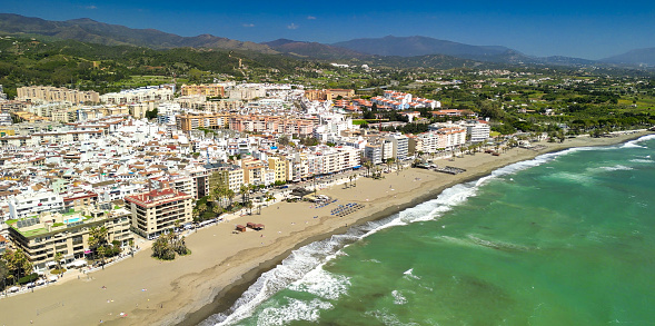 Estepona, Andalusia. Beautiful aerial view of cityscape along the coast in the morning.