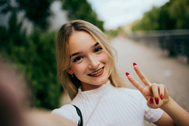 istock teenager girl using smart phone 1483564103