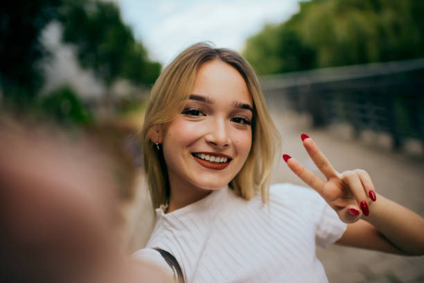 istock teenager girl using smart phone 1483564107