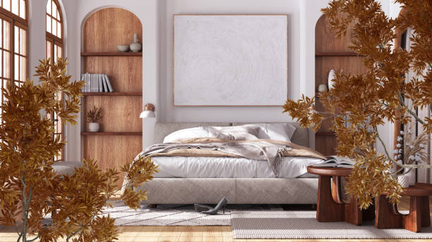 istock Orange yellow and red fall leaves, tree branch over interior design scene. Natural ecology concept idea. Japandi bedroom with bed and decors, minimalist interior design 1483567199