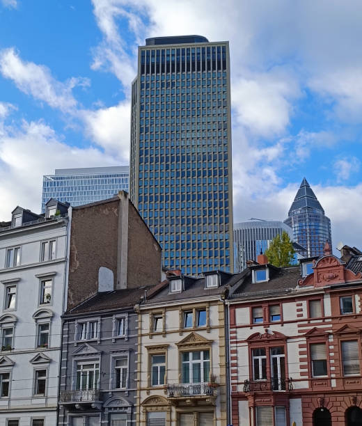 Old monuments and buildings with tall skyscrapers in the background stock photo