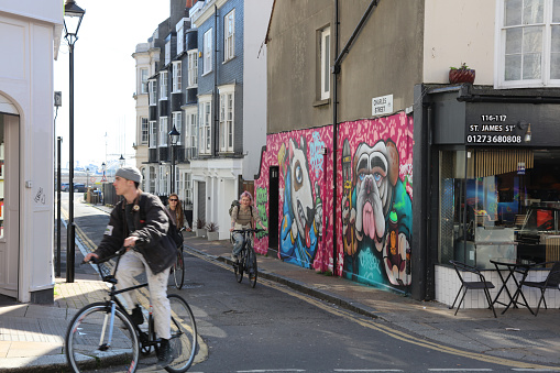 Brighton, United Kingdom - April 15, 2022: Graffiti, public street art in Brighton, UK.