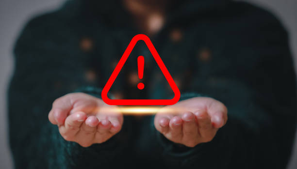 istock Caution warning  for notification error and  to be aware of the dangers of being hacked by hackers,Internet malware viruses are destroying computer data.Compromised information Malicious software. 1483568785