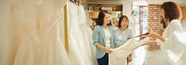 istock choosing the wedding dress with mum 1483569698