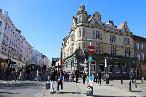 Chester, UK: Jun 14, 2020: A general street scene of Chester City centre on a Sunday afternoon. Many shops and restaurants are closed and few people due to the Covid-19 restrictions.