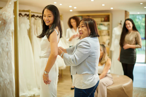 istock choosing the wedding dress with mum 1483569959