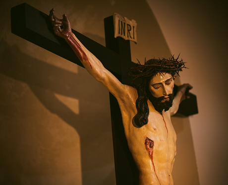 Rome, Italy - March 25, 2015: Rome - The altarpiece of Crucifixion by Guido Reni (1640) in high alar of church Chiesa di San Lorenzo in Lucina.