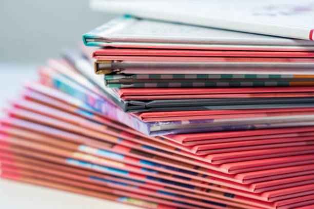 istock multi-colored spines of photo books close-up, partial blur 1483571576