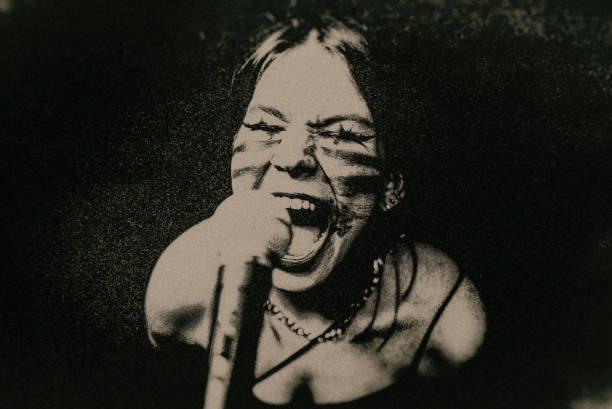 istock The female rock singer. 1483573969