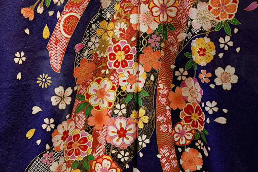 Close-up of kimono textile for sale. The fabrics that kimono are made from are classified in two categories within Japan: Gofuku is the term used to indicate silk kimono fabrics and  Futomono used for Cotton and hemp fabrics.