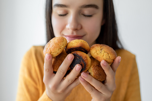 Woman eating cookies