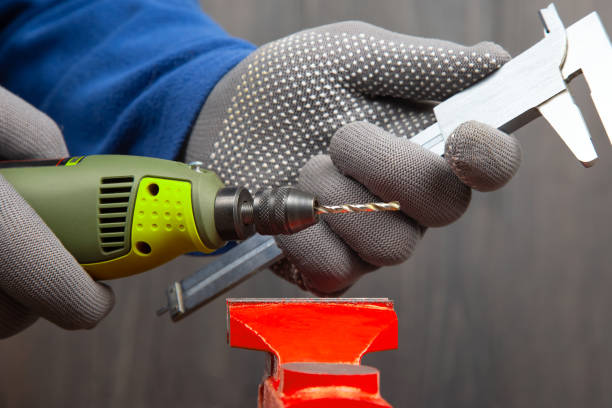 istock Engraving tool for cutting and processing metal and other objects in hand. locksmith industry 1483579540
