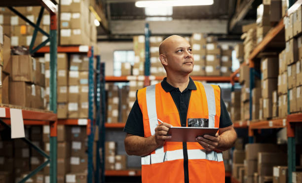 istock Warehouse, logistics and inspection man on tablet for stock inventory, storage boxes and industrial or courier service. Person or manager on digital tech in package management, e commerce or business 1483579635