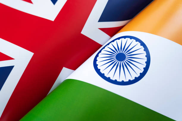 istock Flags Great Britain and india. concept of international relations between countries. The state of governments. Friendship of peoples. 1483580017