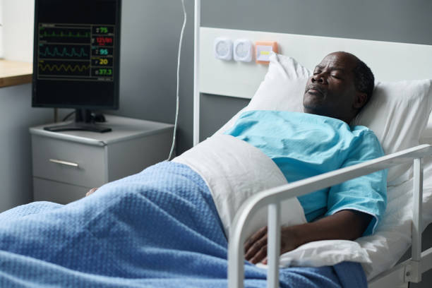 istock Patient lying on bed in ward 1483580488