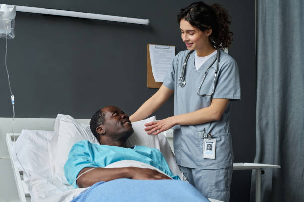 istock Nurse caring about patient in ward 1483582775