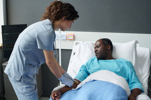 istock Nurse making dropper for sick patient 1483582966