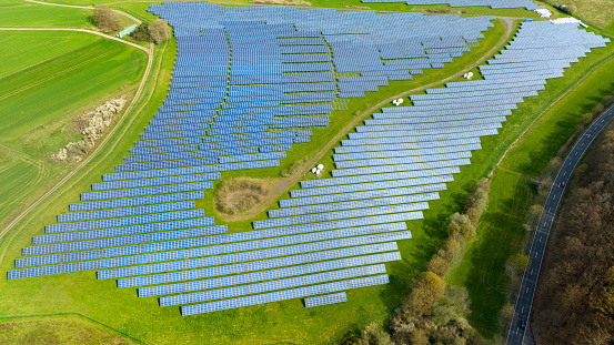 Larg solar power plant in springtime - aerial view