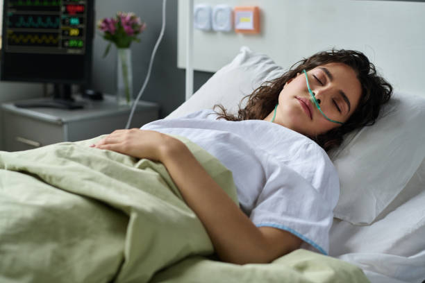 istock Patient sleeping in hospital ward 1483583714