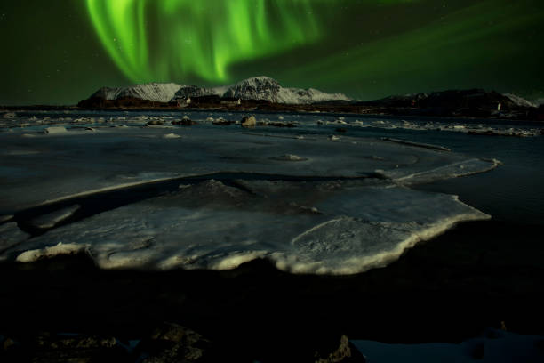 istock A beautiful green and red aurora dancing over , Iceland 1483589626