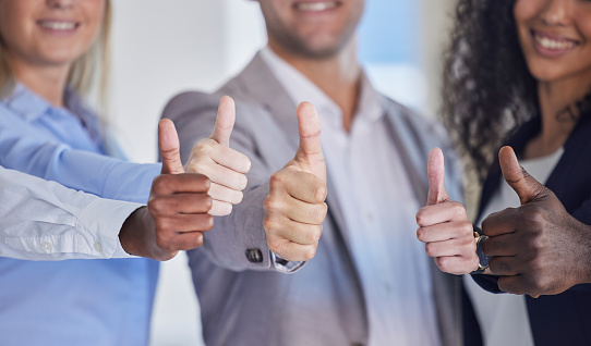 Thumbs up, hands and business people agreement with diversity, yes and success with motivation and collaboration. Achievement, hand sign and emoji with employee group, like and solidarity with team