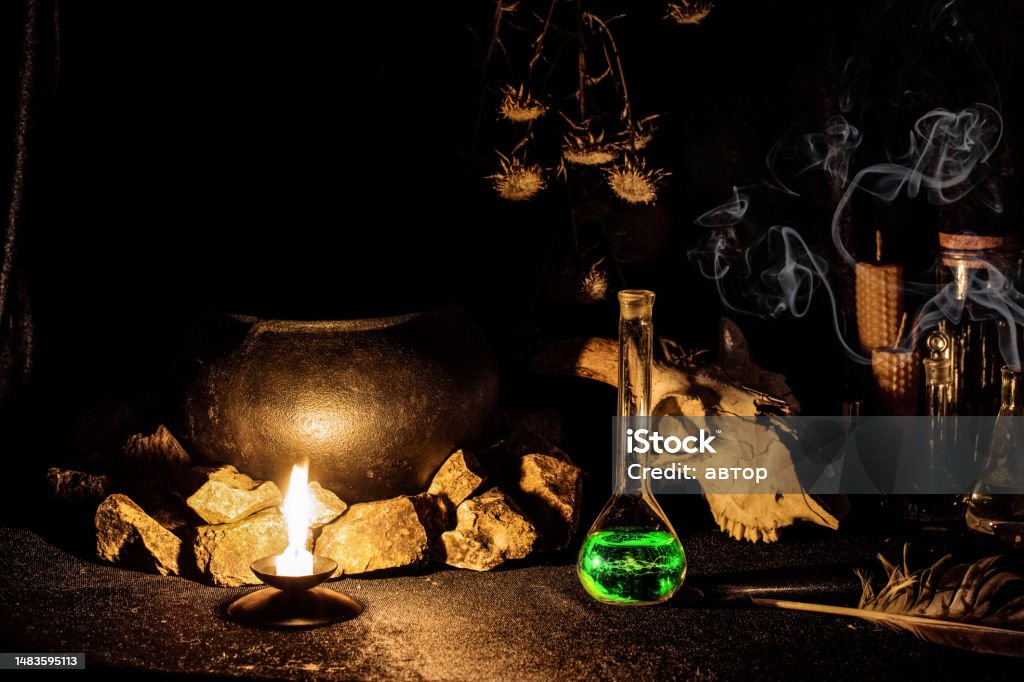 Witchs Altar With Goats Skull Burning Candle Dry Herbs And Witchcraft  Potion In Vessel In The Dark Low Key Selective Focus Stock Photo - Download  Image Now - iStock